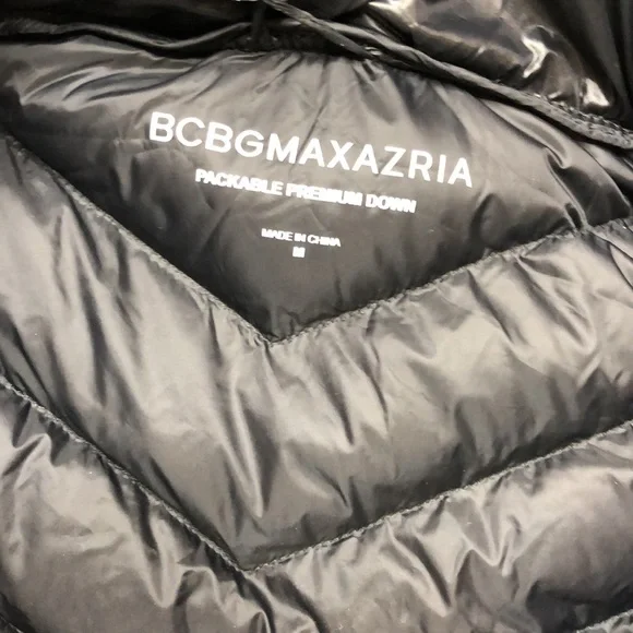 Bcbgmaxazria Black, puffy jacket with hood and bag to pack it and travel with